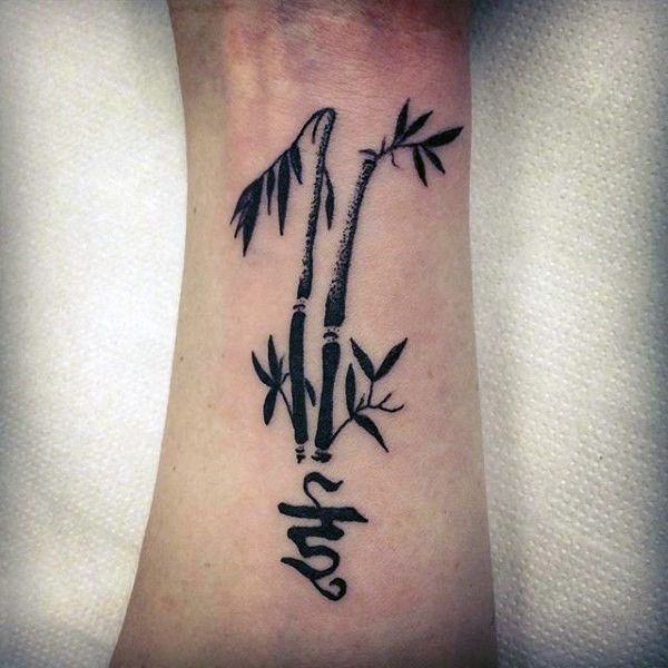 Cool Black Ink Bamboo Tree Tattoo On Wrist