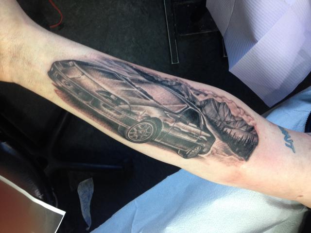 Cool Black Ink Camaro Car Tattoo On Right Forearm