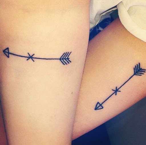 Cool Black Outline Arrow Tattoo On Couple Forearm