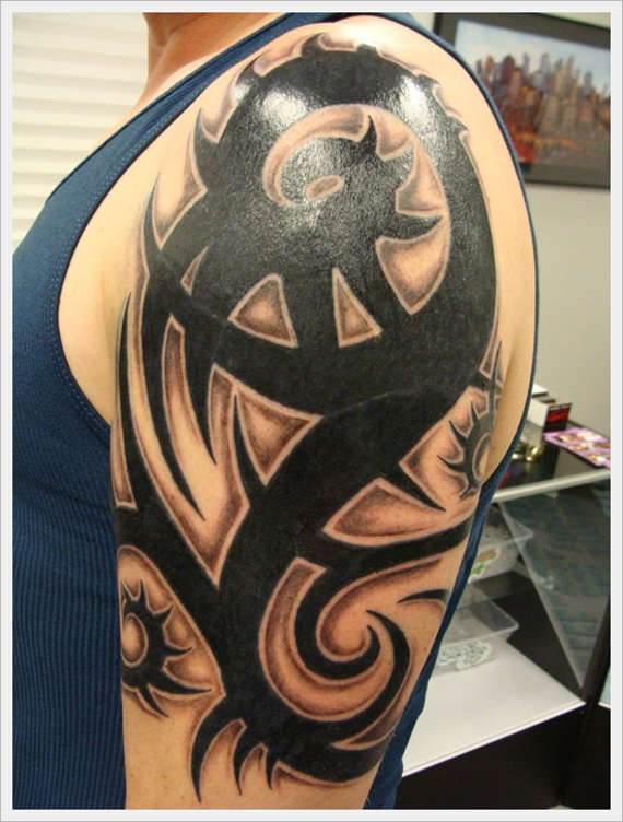 Cool Black Tribal Design Tattoo On Left Upper Arm