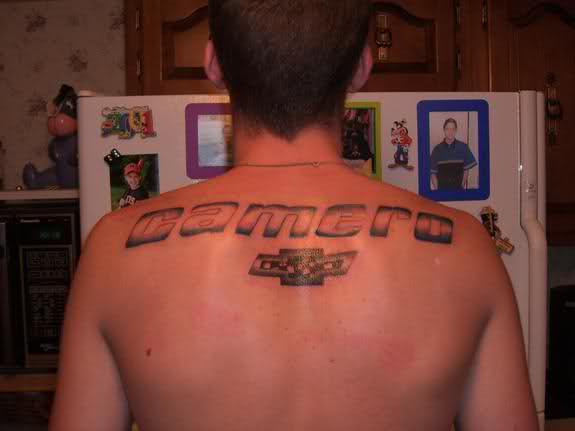 Cool Camaro Lettering Tattoo On Man Upper Back