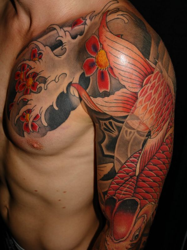 Cool Fish Tattoo On Man Left Half Sleeve
