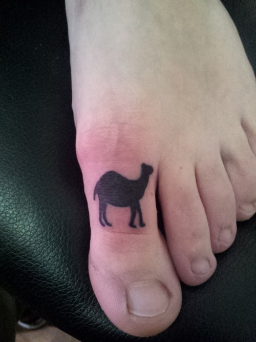 Cool Silhouette Camel Tattoo On Left Foot Toe