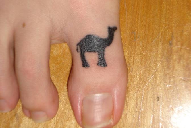 Cool Silhouette Camel Tattoo On Right Foot Toe