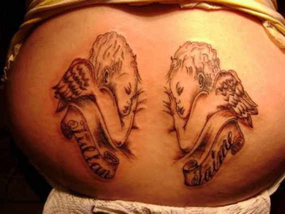 Cute Two Sleeping Baby Angel With Banner Tattoo Design