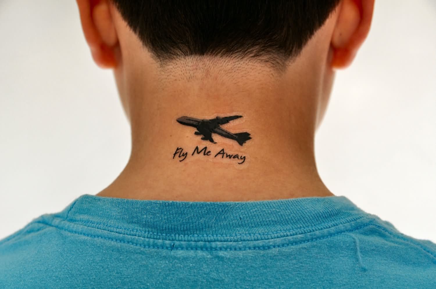 Fly Me Away – Silhouette Airplane Tattoo On Man Back Neck