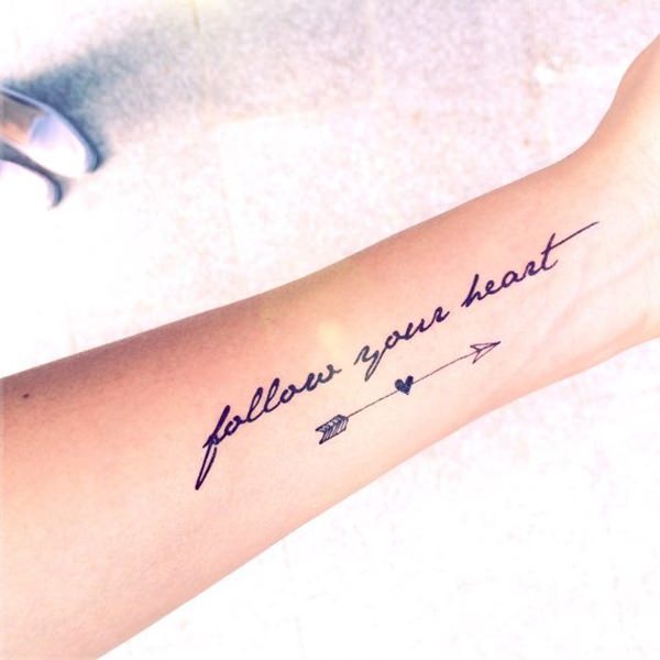 Follow Your Heart - Black Arrow Tattoo On Left Forearm