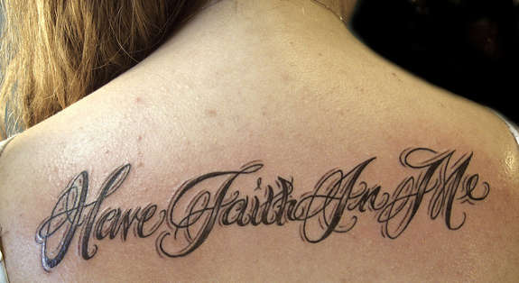 Have Faith In Me Lettering Tattoo On Women Upper Back
