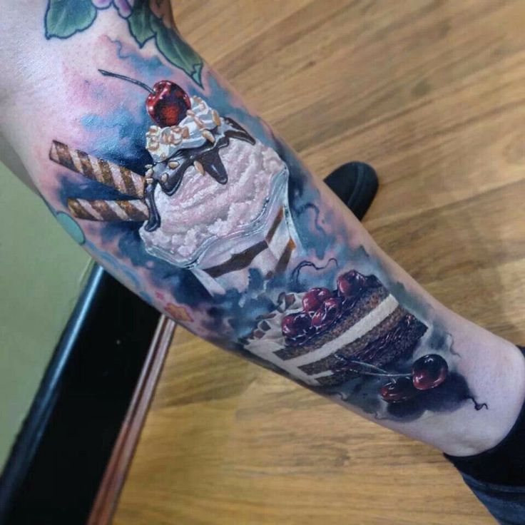 Impressive Realistic Cupcake Tattoo On Right Leg By Benjamin Laukis