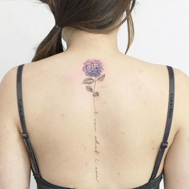 Inspiring Flower Tattoo On Women Upper Back