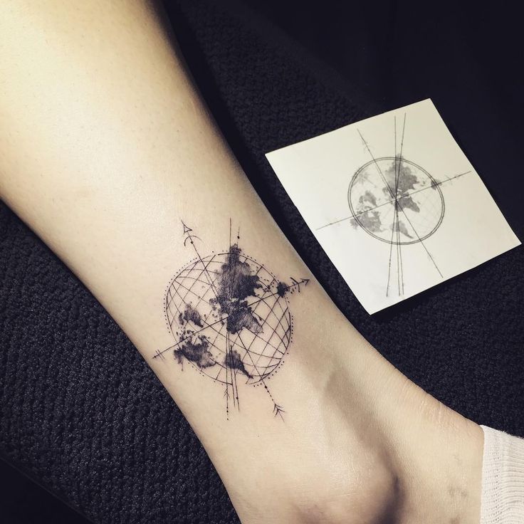 Latest Black And Grey Globe Tattoo On Right Ankle
