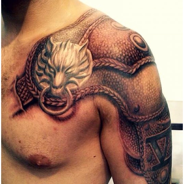 Latest Black Ink Armor Tattoo On Man Left Shoulder