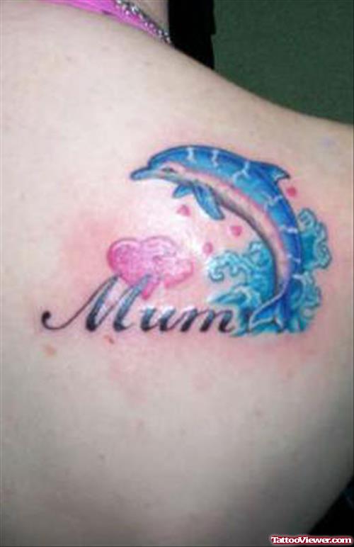 Mum – Aqua Dolphin Tattoo On Right Back Shoulder