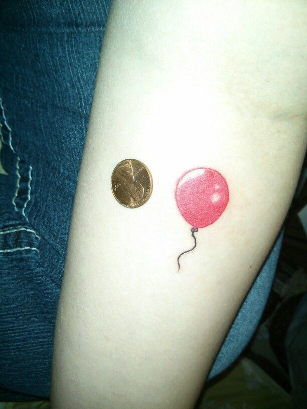 Pink Ink Balloon Tattoo On Right Forearm