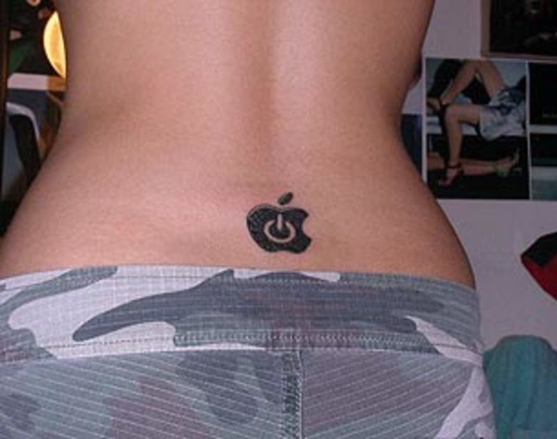 Power Button In Apple Logo Tattoo On Lower Back