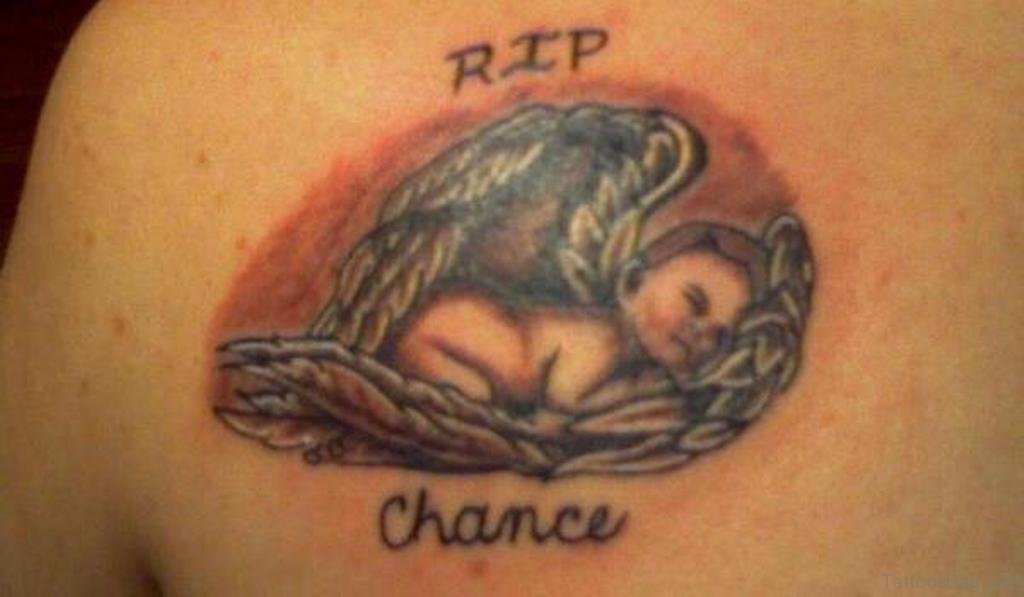RIP Chance - Black Ink Sleeping Baby Angel Tattoo On Left Back Shoulder