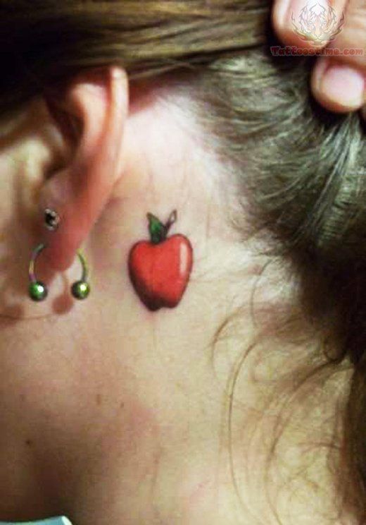 Red Ink Apple Tattoo On Women Left Behind The Ear