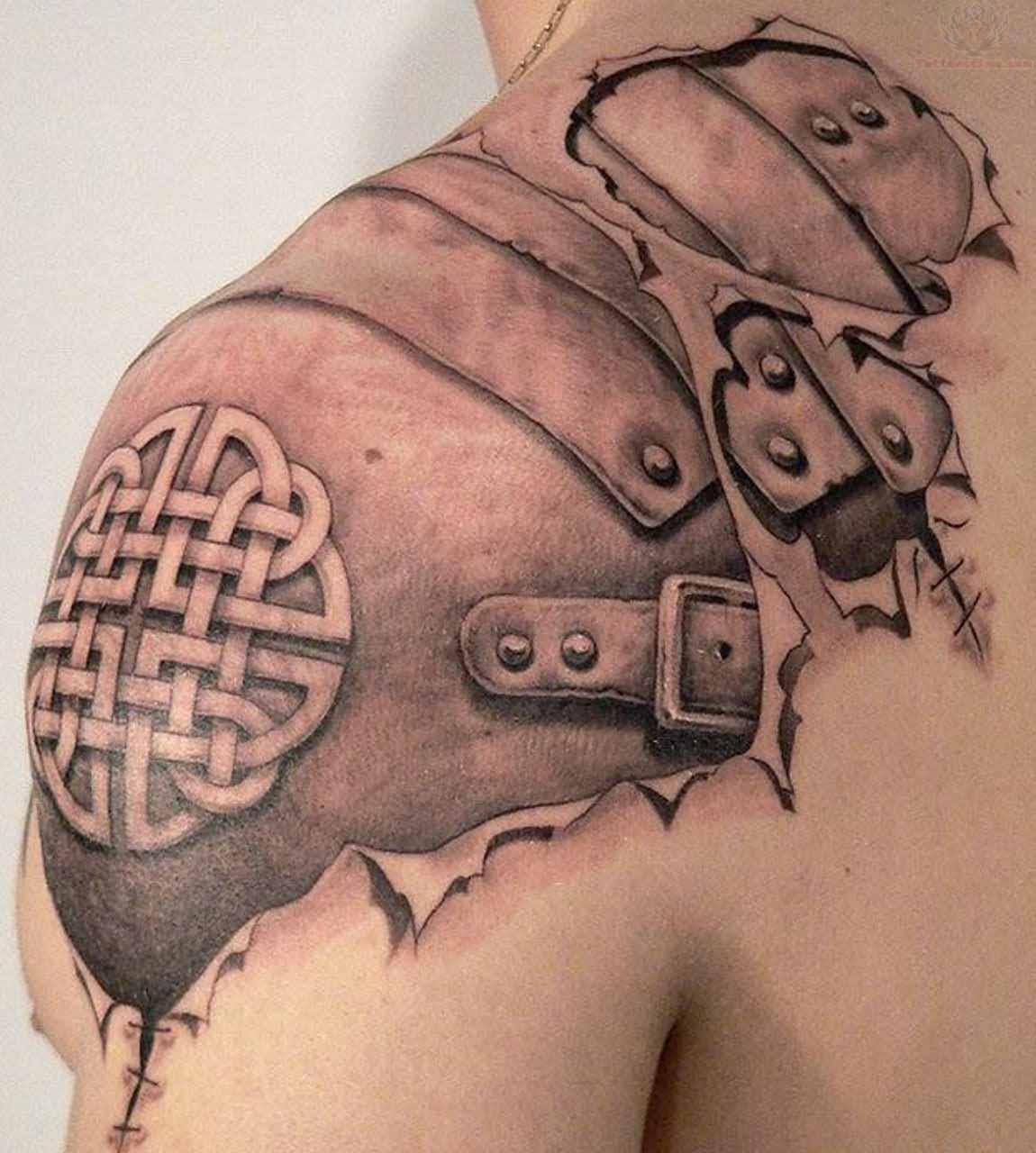 Ripped Skin Celtic Armor Tattoo On Man Left Shoulder