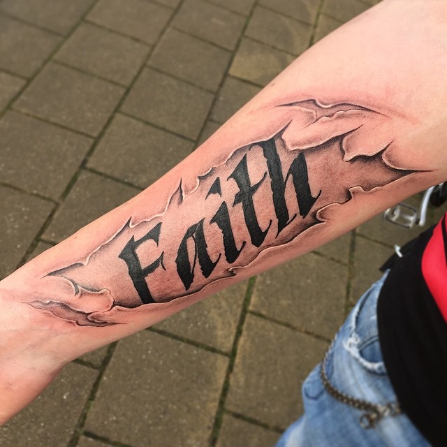 Ripped Skin Faith Lettering Tattoo On Right Forearm.