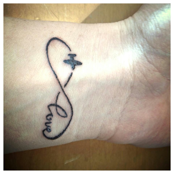 Silhouette Airplane With Infinity And Love Tattoo On Wrist