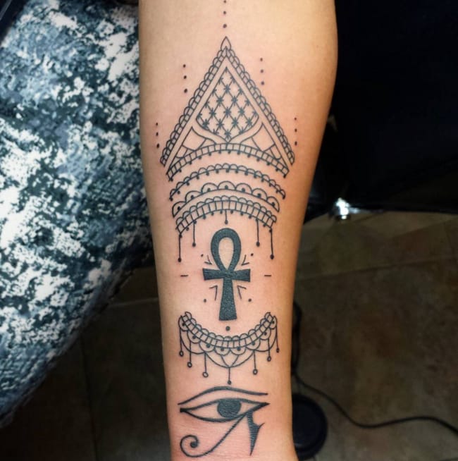 Silhouette Ankh Tattoo On Forearm