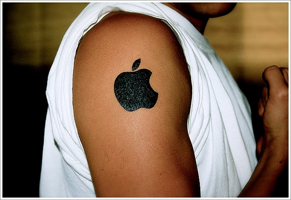 Silhouette Apple Logo Tattoo On Right Shoulder