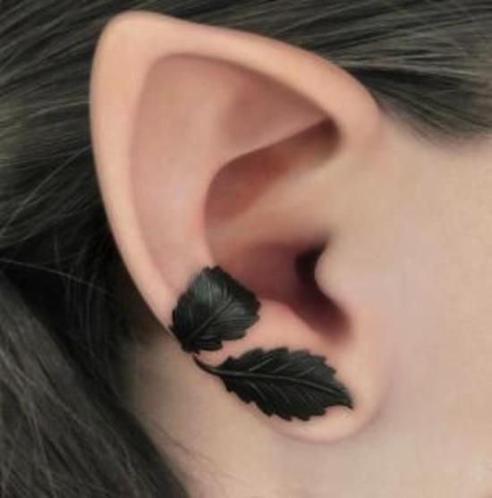 Silhouette Leaves Tattoo On Right Ear