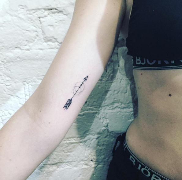 Small Black Ink Arrow Tattoo On Right Bicep