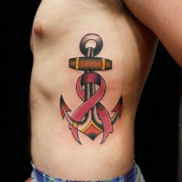 Traditional Anchor With Cancer Ribbon Tattoo On Man Left Side Rib