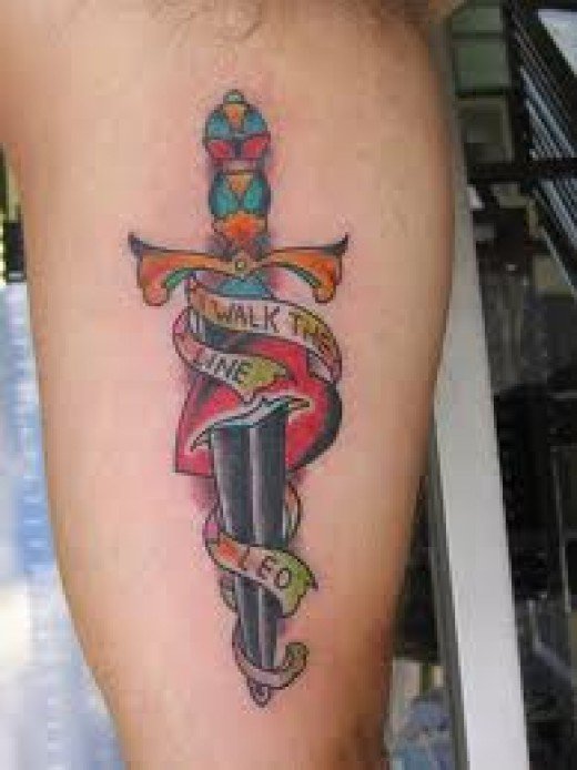 Traditional Dagger In Heart With Banner Tattoo Design For Half Sleeve