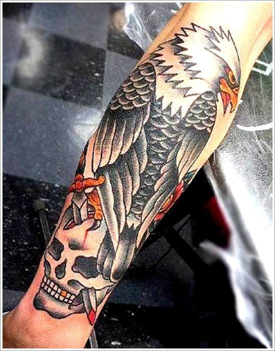 Traditional Eagle With Sword In Skull Tattoo On Forearm