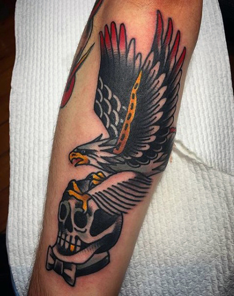 Traditional Flying Eagle With Skull Tattoo On Forearm