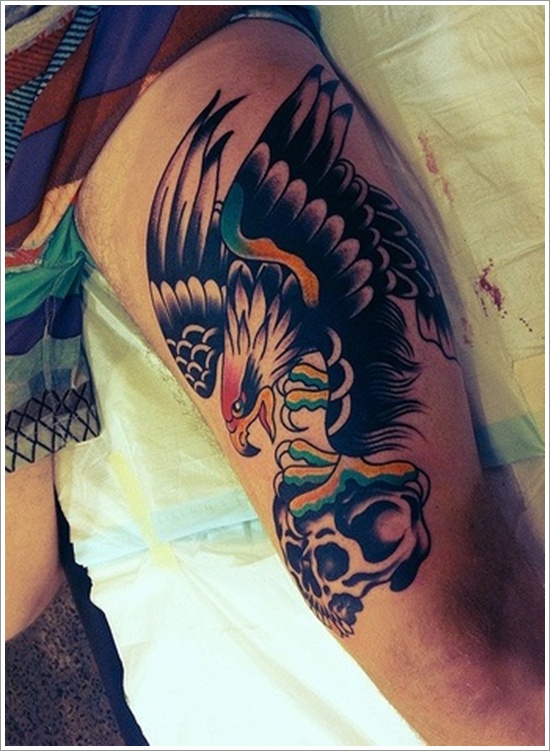 Traditional Flying Eagle With Skull Tattoo On Thigh