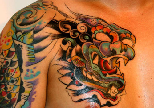Traditional Foo Dog Tattoo On Man Right Chest