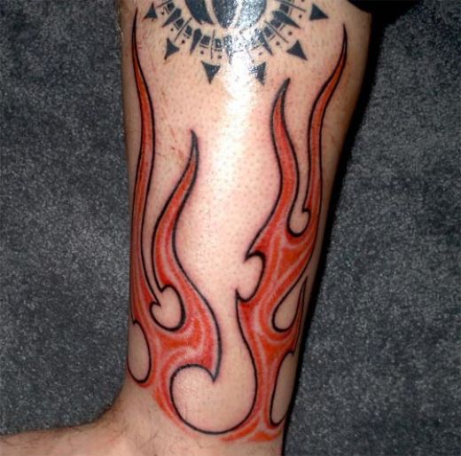 Tribal Fire And Flame Tattoo On Half Sleeve