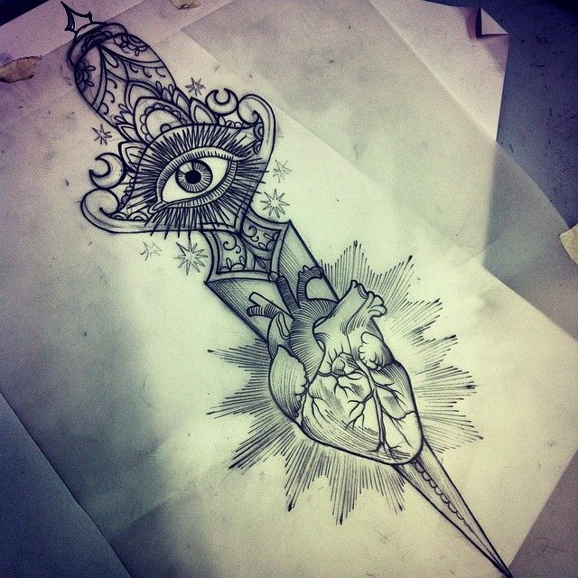 Unique Black Ink Dagger With Real Heart Tattoo Design