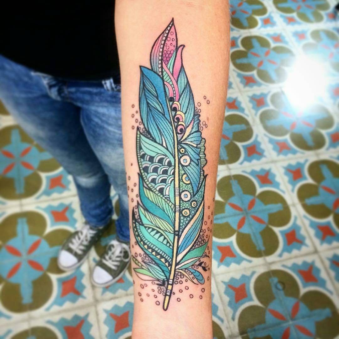 Unique Colorful Feather Tattoo On Forearm