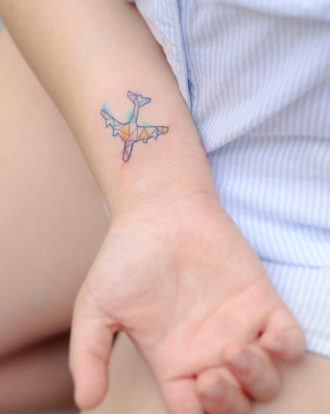 Watercolor Airplane Tattoo on Right Wrist
