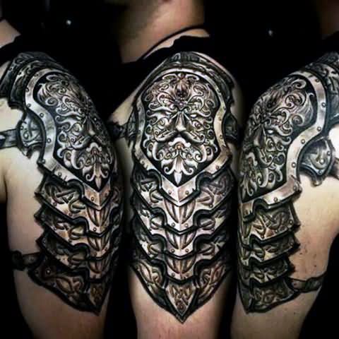Wonderful Black Ink Armor Tattoo On Man Left Half Sleeve