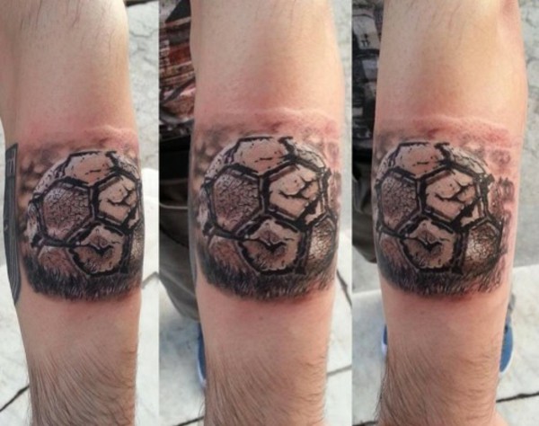 Wonderful Black Ink Football Tattoo On Sleeve