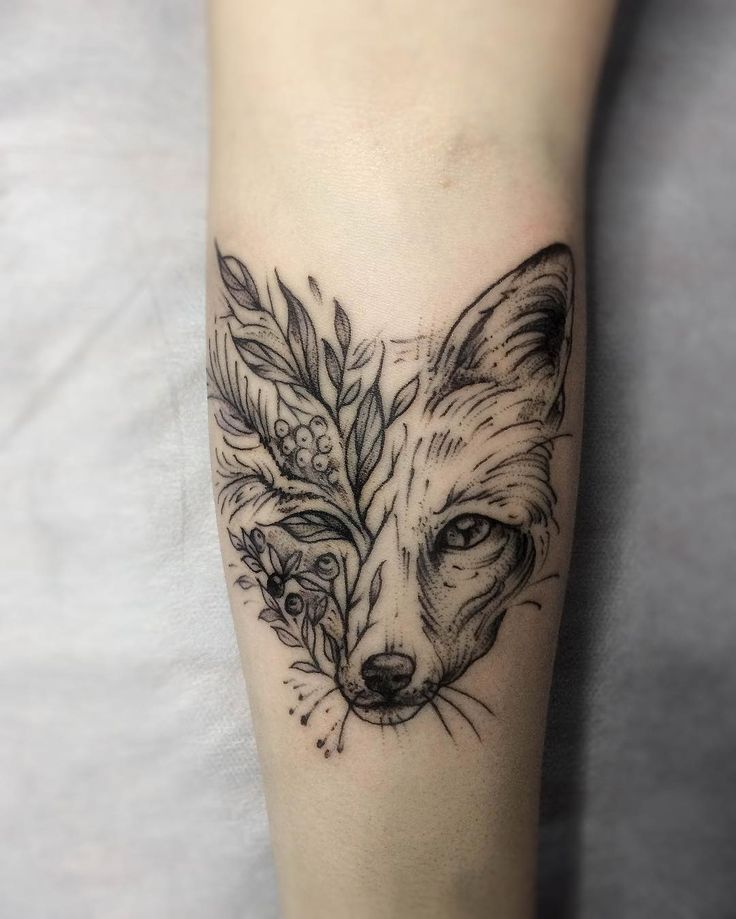 Wonderful Black Ink Fox Head Tattoo On Sleeve