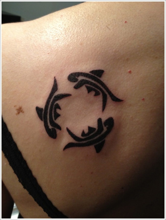 Wonderful Black Three Fishes Tattoo On Girl Left Back Shoulder