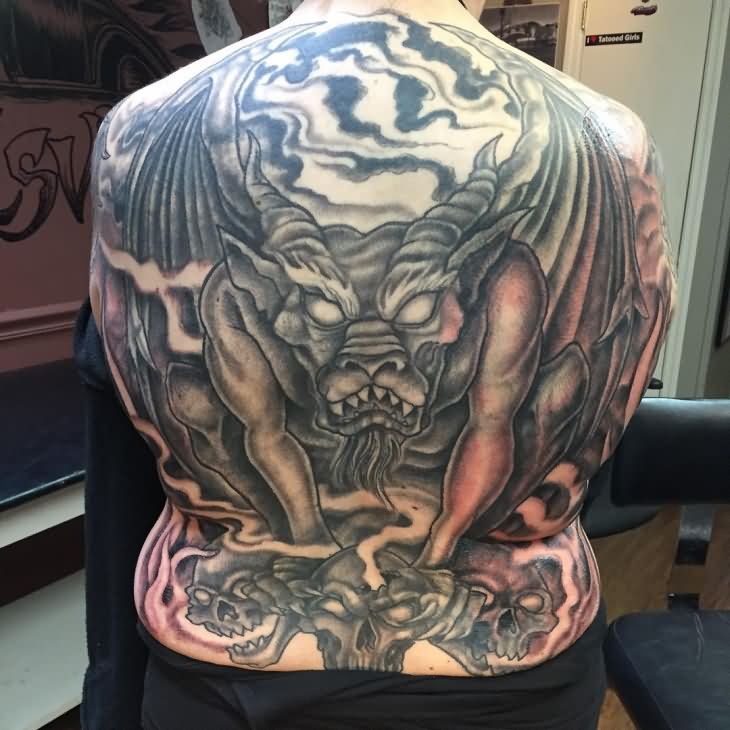 Attractive Black Ink Gargoyle Tattoo On Man Full Back.