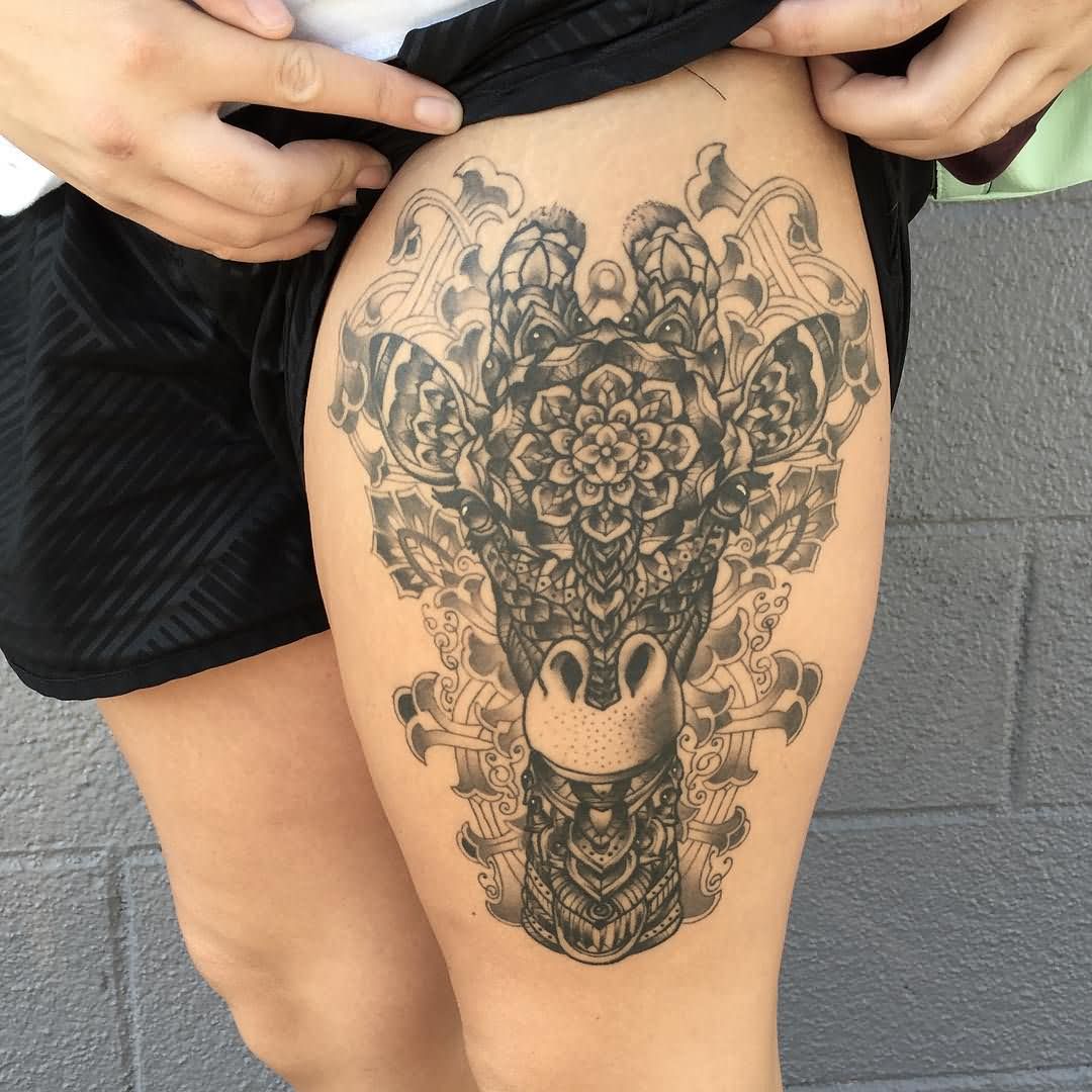 Attractive Black Ink Giraffe Head Tattoo On Left Thigh