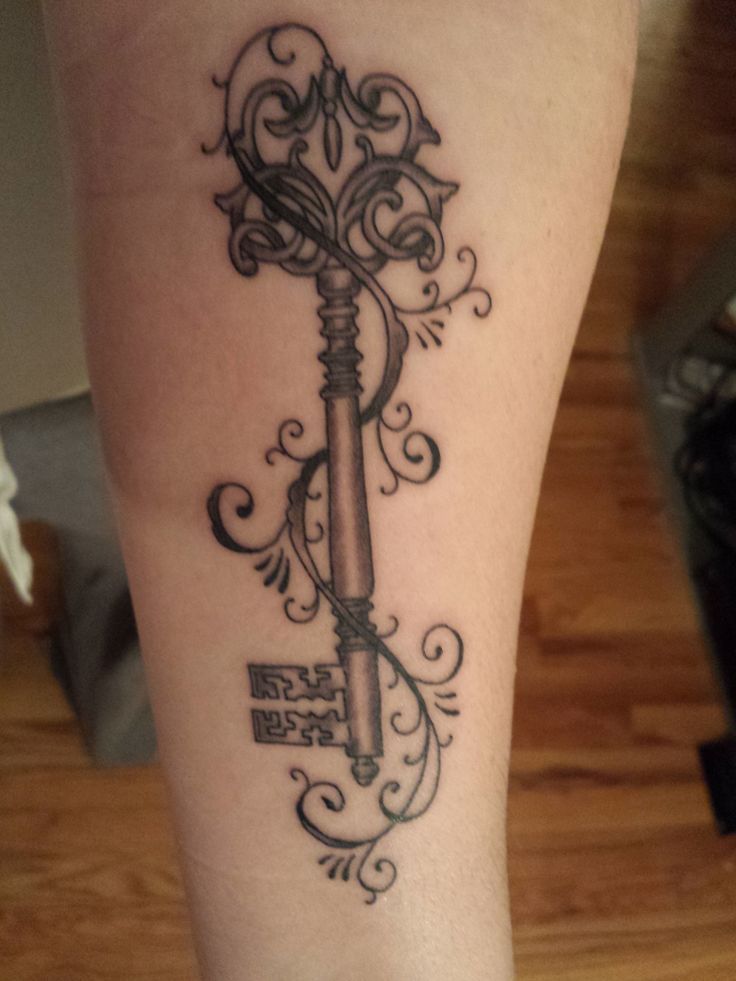 Attractive Black Ink Key Tattoo Design For Arm