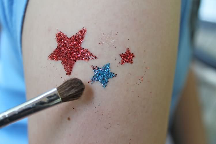 Awesome Glitter Stars Tattoo On Left Shoulder