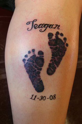 Awesome Memorial Footprints Tattoo On Leg Calf