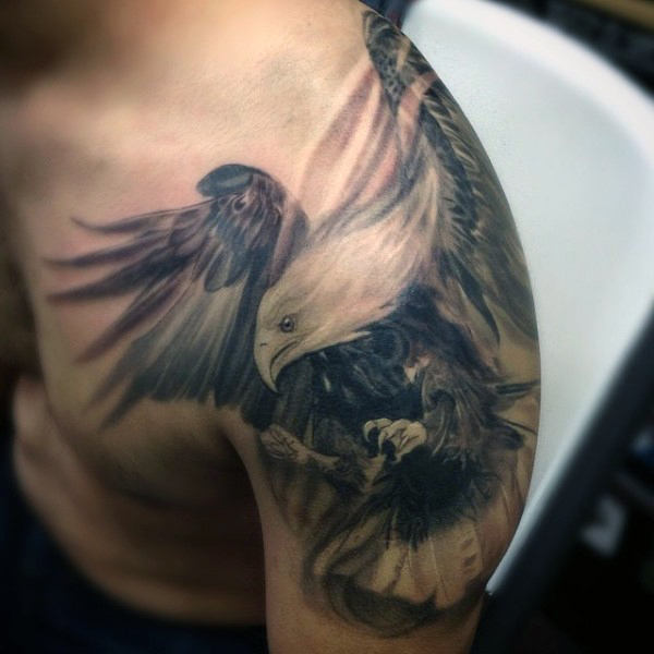 Black And Grey Flying Hawk Tattoo On Man Left Shoulder