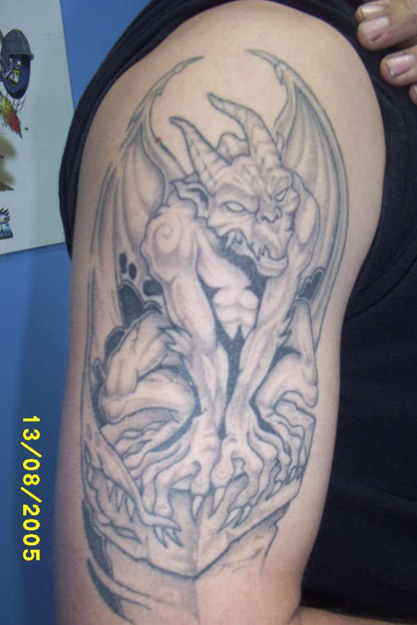 Black And Grey Gargoyle Tattoo On Man Right Half Sleeve