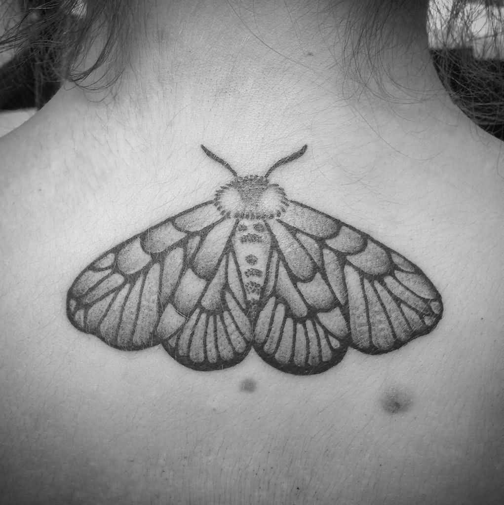 Black And Grey Insect Tattoo On Upper Back
